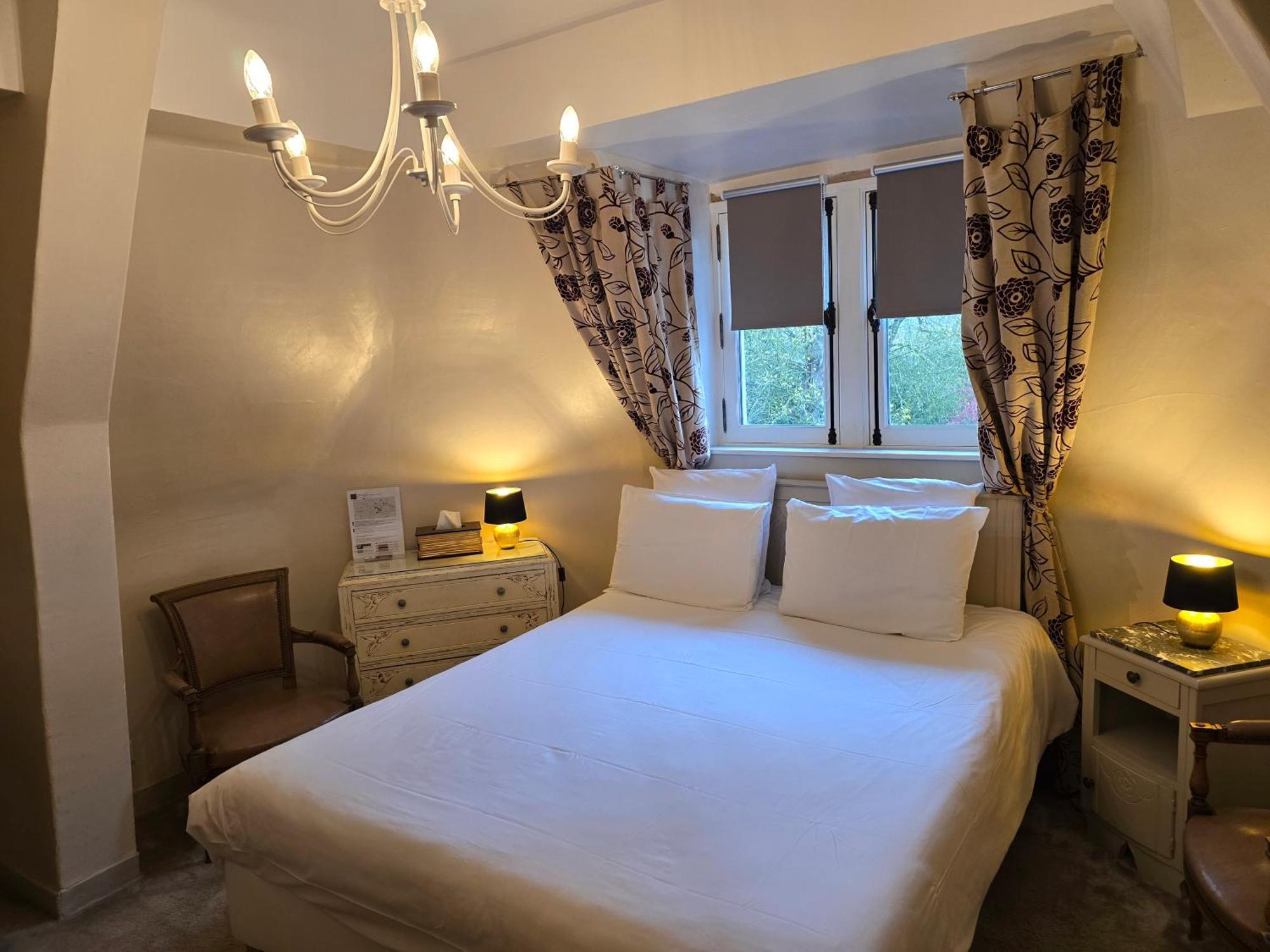 Le Castel Guesthouse Байо Екстериор снимка